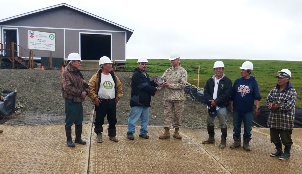 Machut presents plaque